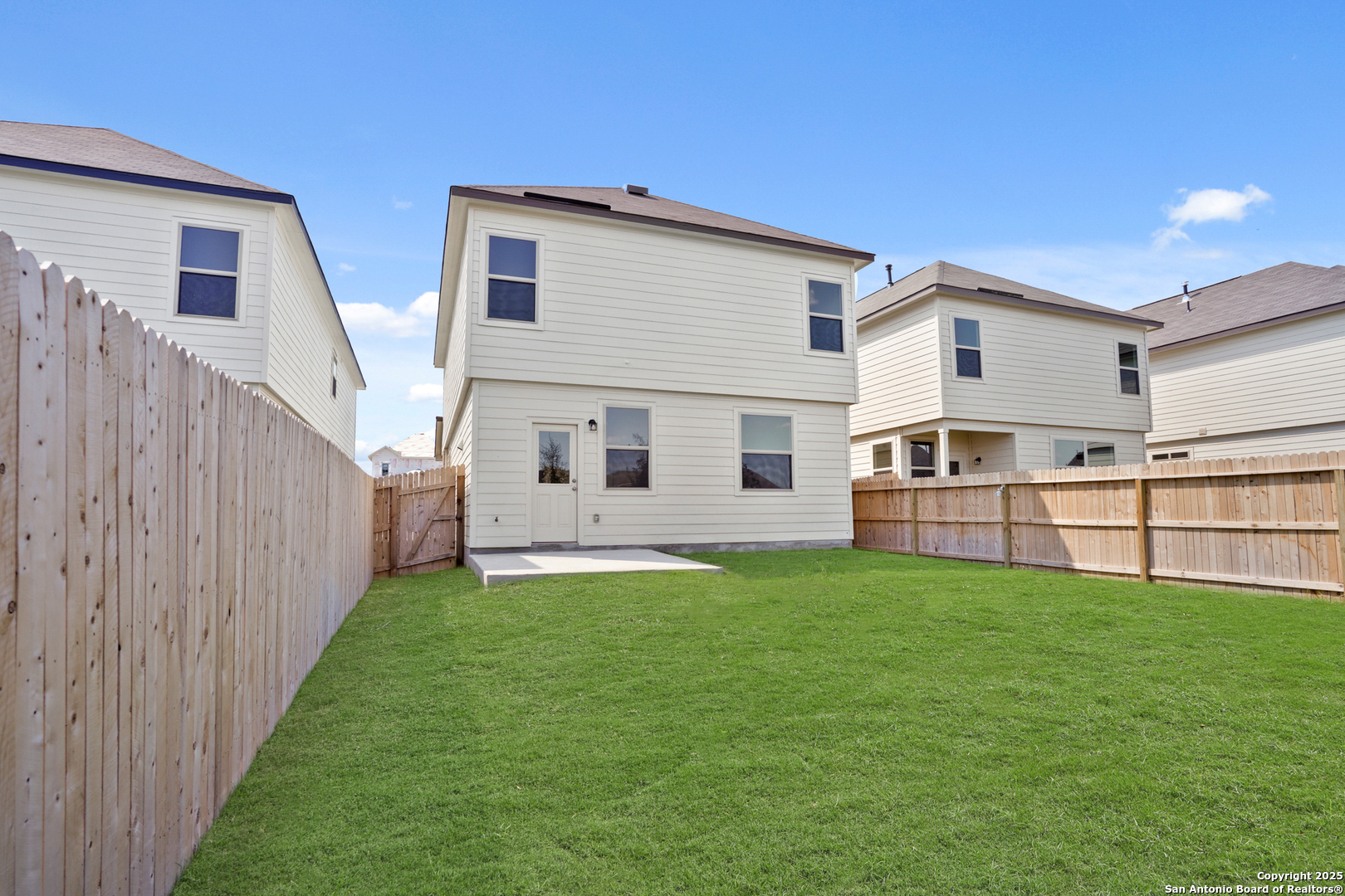 4946 Blue Ranch San Antonio, TX 78222 - Photo 23 of 32 a view of a house with a yard and porch