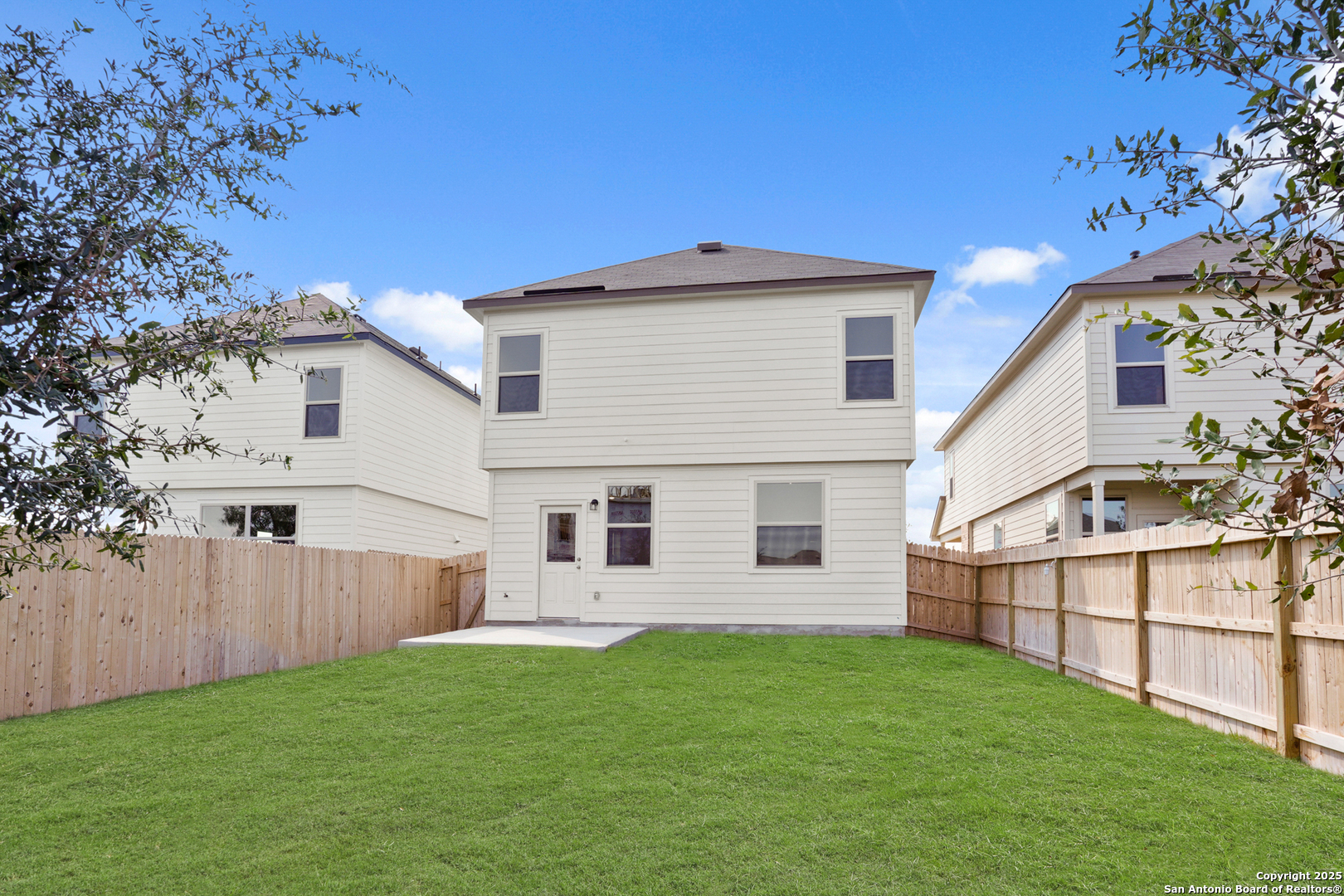 4946 Blue Ranch San Antonio, TX 78222 - Photo 24 of 32 a view of backyard with small cabin