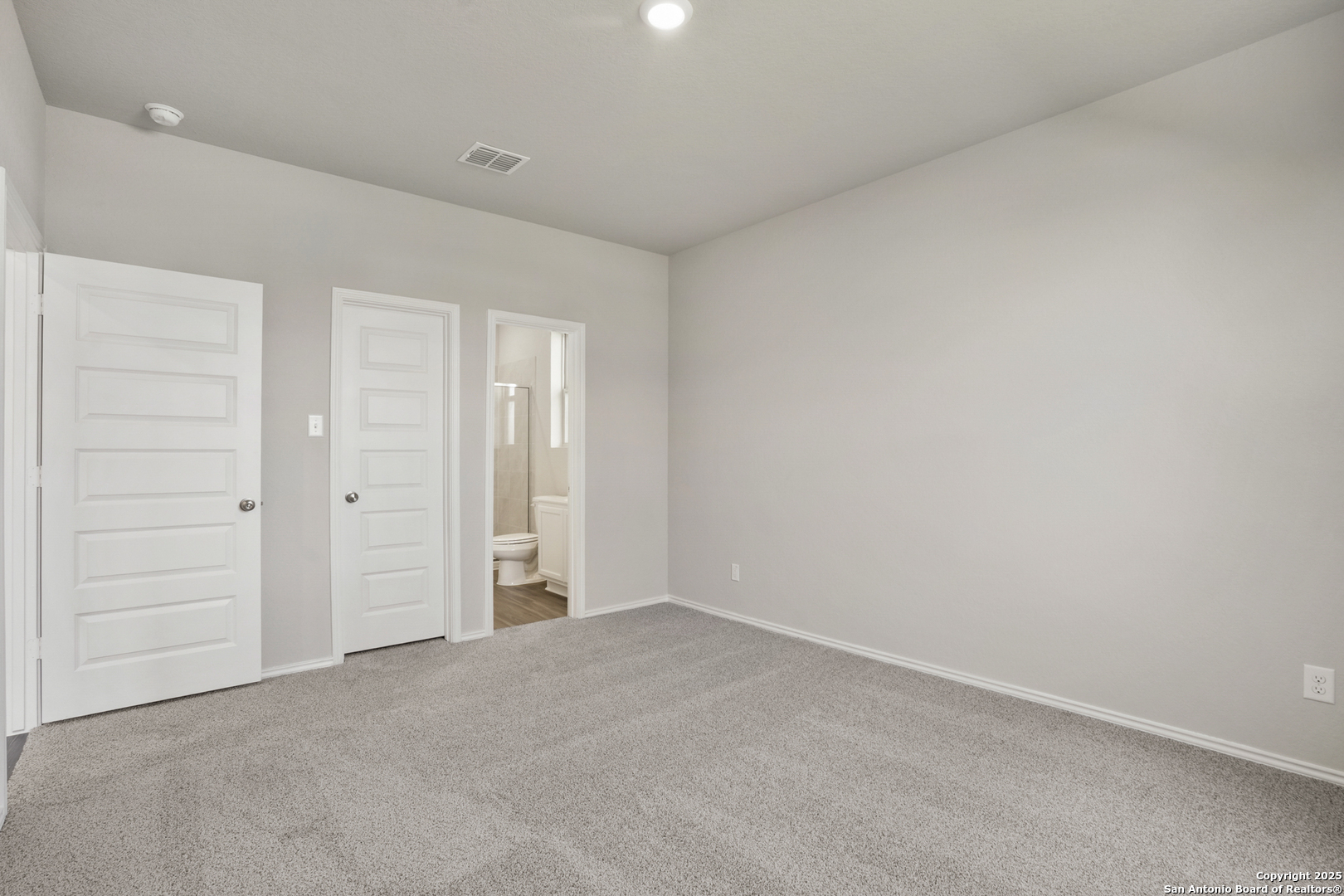 4946 Blue Ranch San Antonio, TX 78222 - Photo 9 of 32 an empty room with closet area