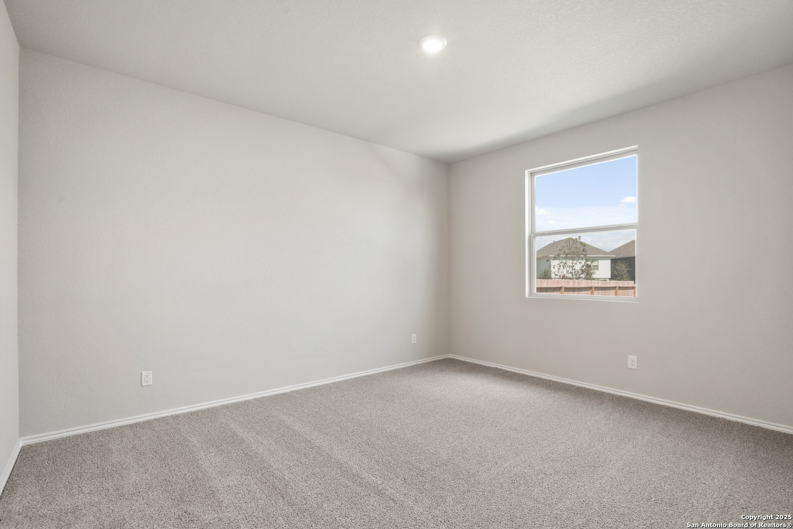 4946 Blue Ranch San Antonio, TX 78222 - Photo 10 of 32 an empty room with a window