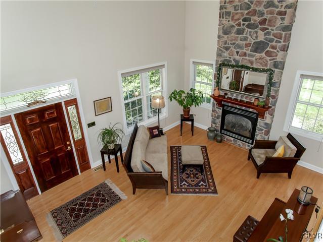 135 Kichline Road Hellertown, PA 18055 - Photo 17 of 43 a living room with furniture rug and fireplace