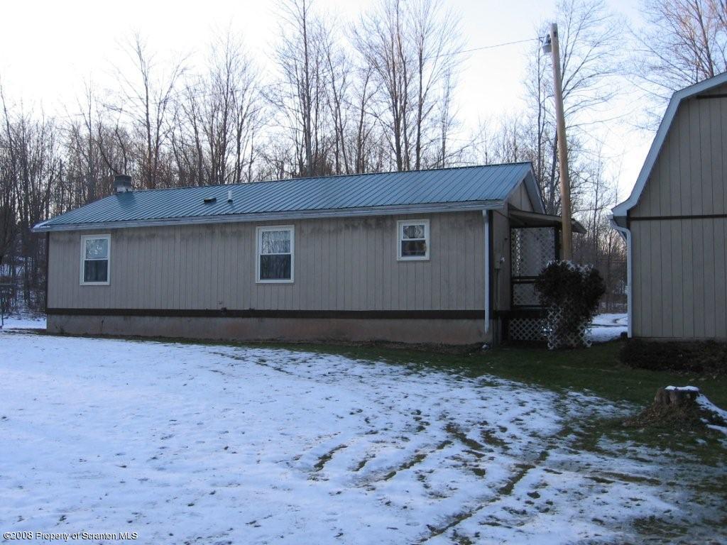 169 A Rt 29n Nicholson, PA 18446 - Photo 2 of 4 a house with trees in the background
