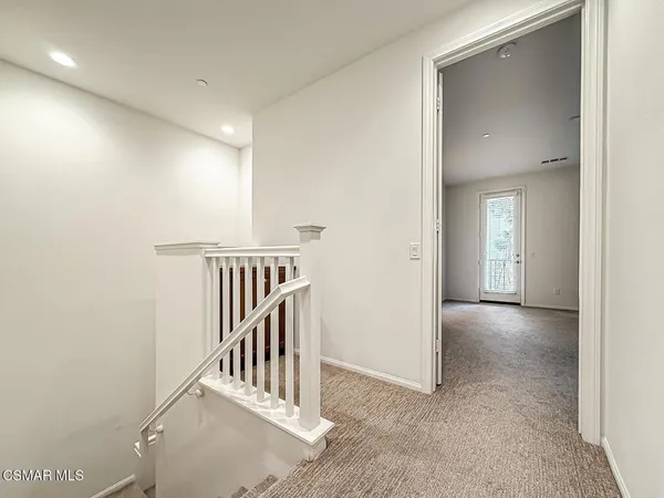 a view of a hallway with entryway