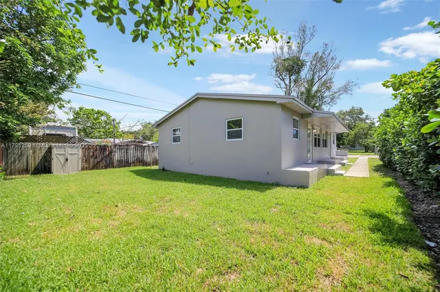 a house view with a garden space