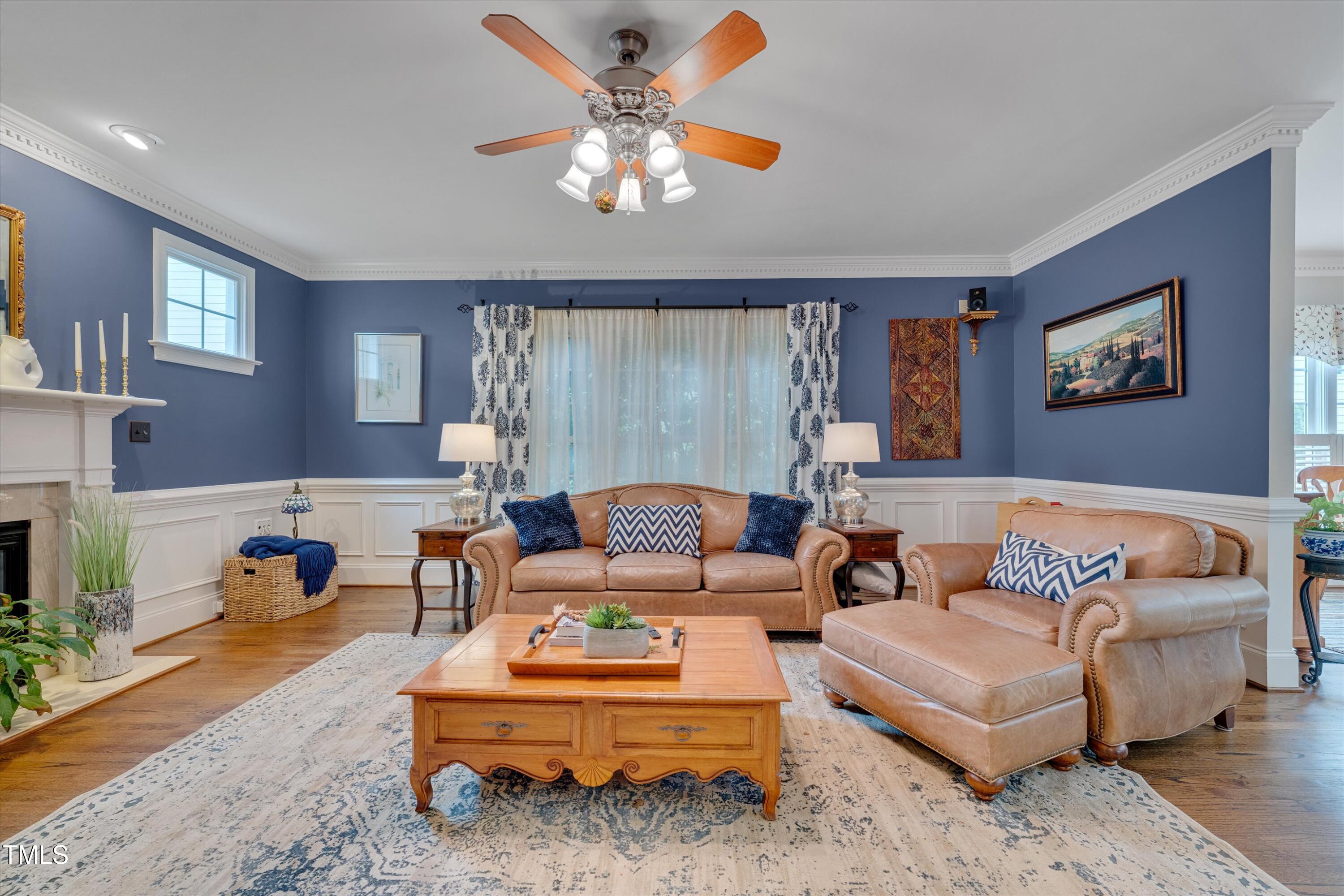 8308 Cazavini Court Raleigh, NC 27613 - Photo 21 of 46 a living room with furniture and a fireplace