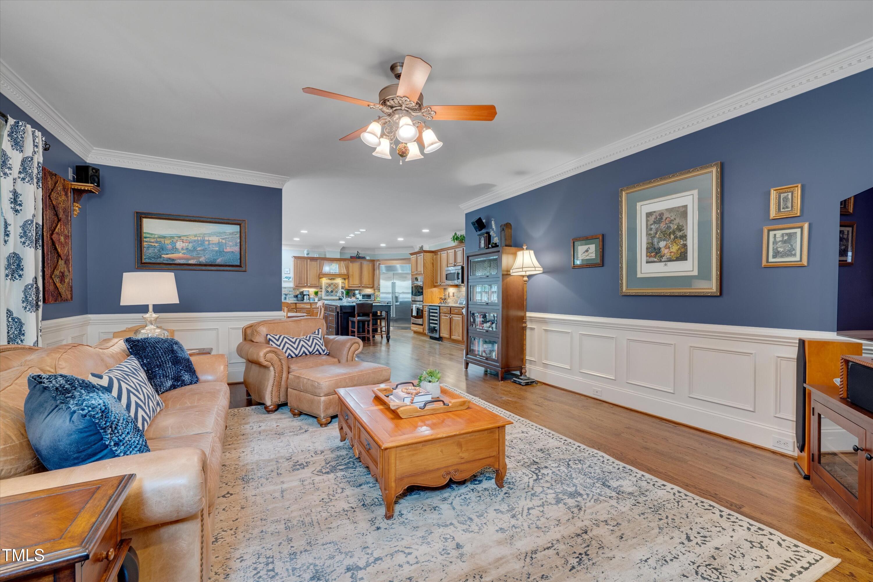 8308 Cazavini Court Raleigh, NC 27613 - Photo 22 of 46 a living room with furniture and a table