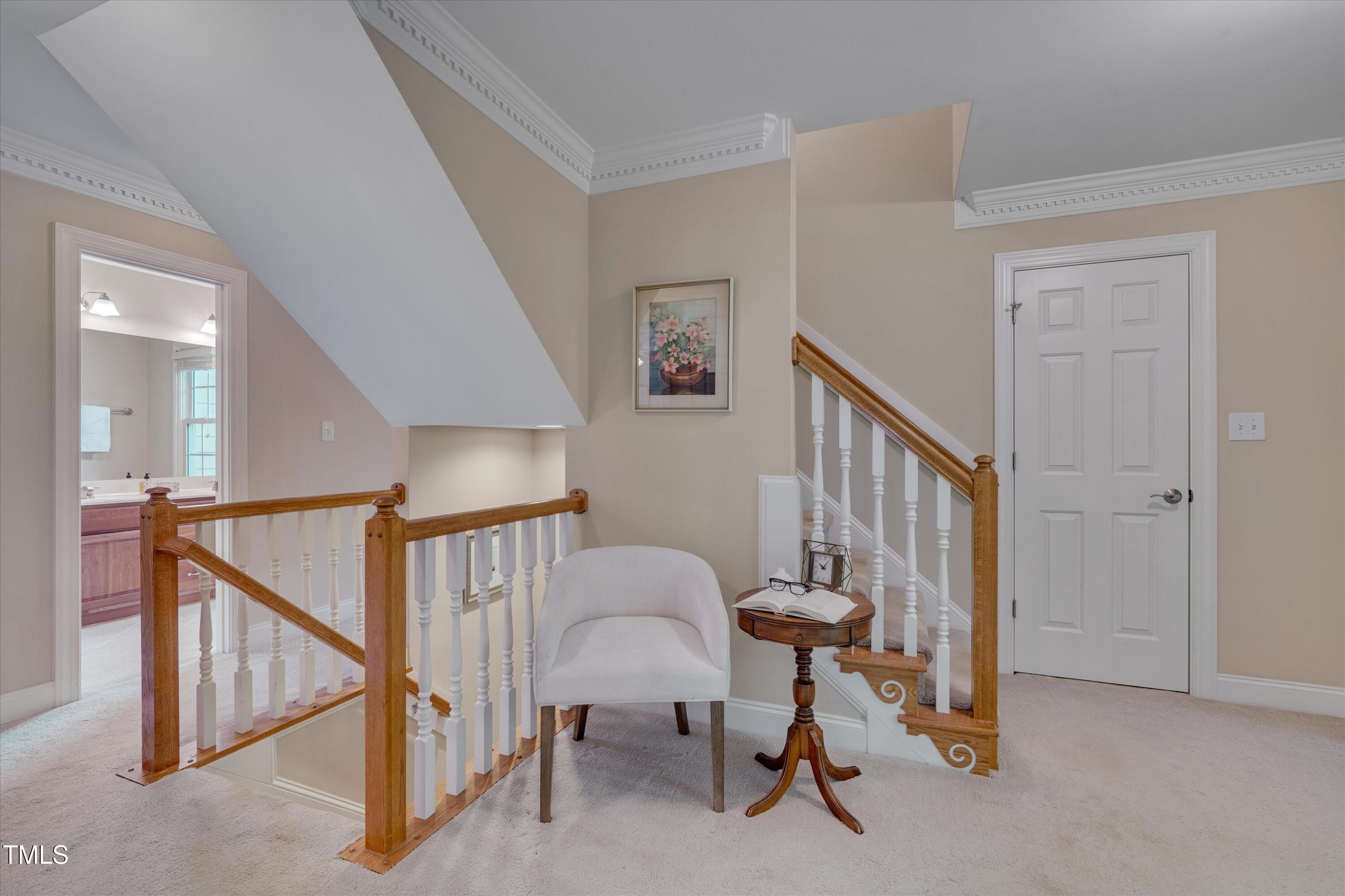 8308 Cazavini Court Raleigh, NC 27613 - Photo 24 of 46 a view of a livingroom with furniture and stairs