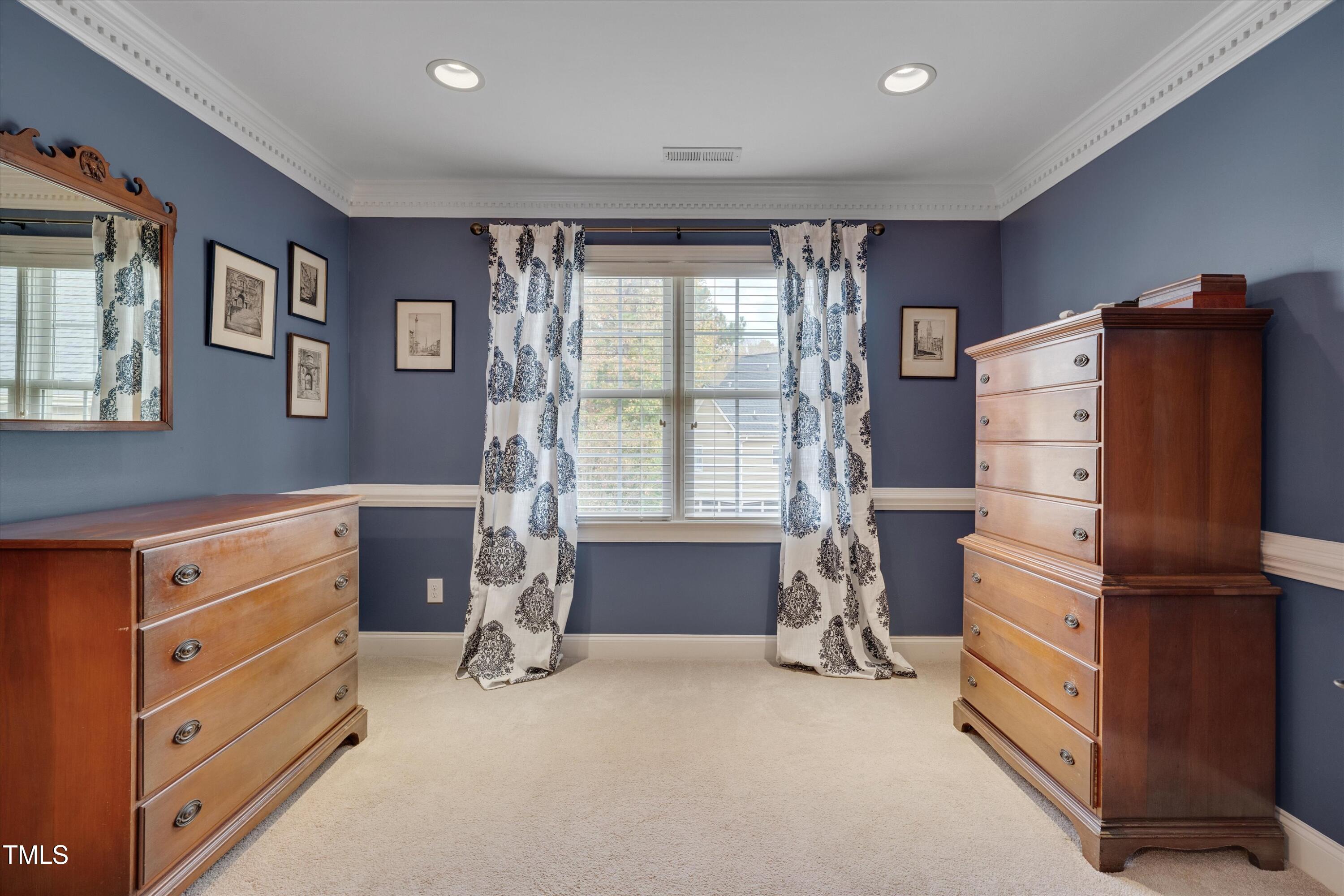 8308 Cazavini Court Raleigh, NC 27613 - Photo 30 of 46 a room with furniture and a window