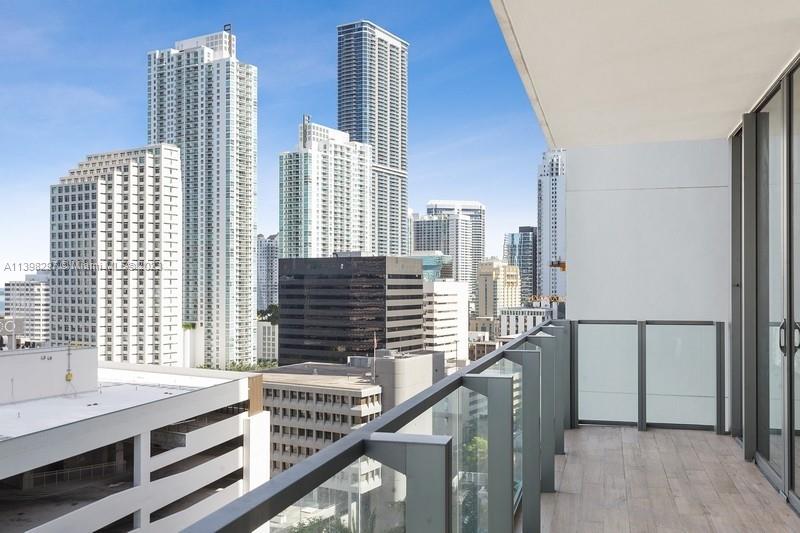 68 Southeast 6th Street, Unit 1209 Miami, FL 33131 - Photo 13 of 15 a view of balcony with furniture