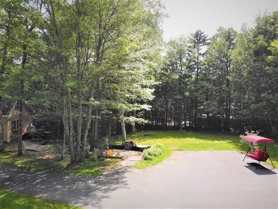 332 Clark Hill Road Holden, ME 04429 - Photo 5 of 26 Side of the house yard