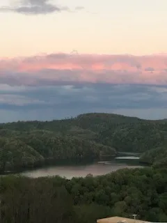 a view of mountain with lake view