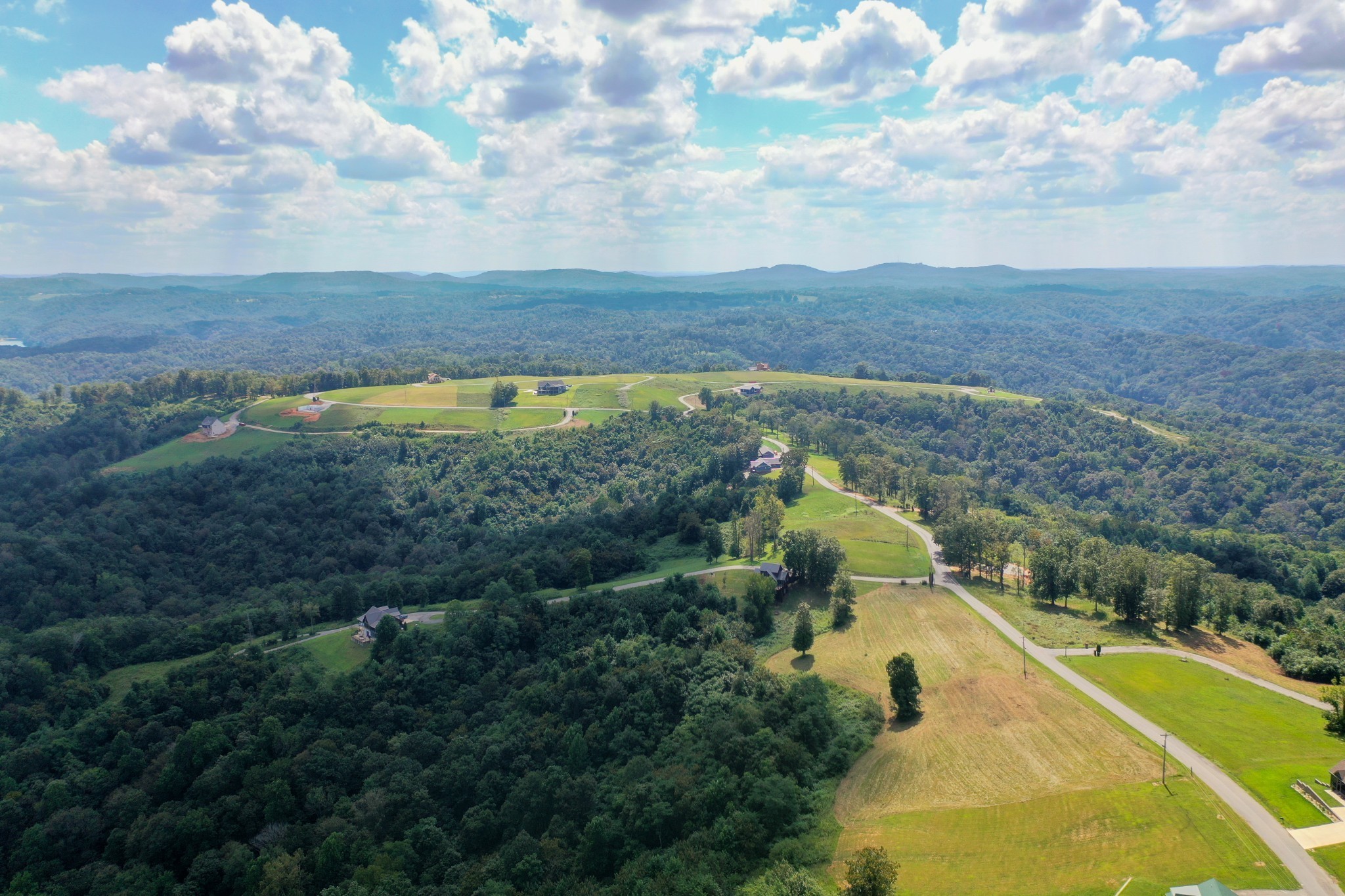 73 B Swan Ridge Road Celina, TN 38551 - Photo 32 of 34 a view of a yard with houses
