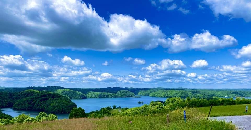 73 B Swan Ridge Road Celina, TN 38551 - Photo 4 of 34 a view of a big yard with lots of green space and mountain view