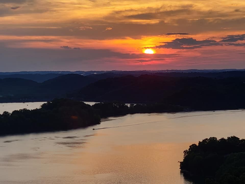 73 B Swan Ridge Road Celina, TN 38551 - Photo 5 of 34 a view of balcony with sunset