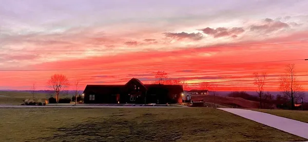 a view of a lake with a yard