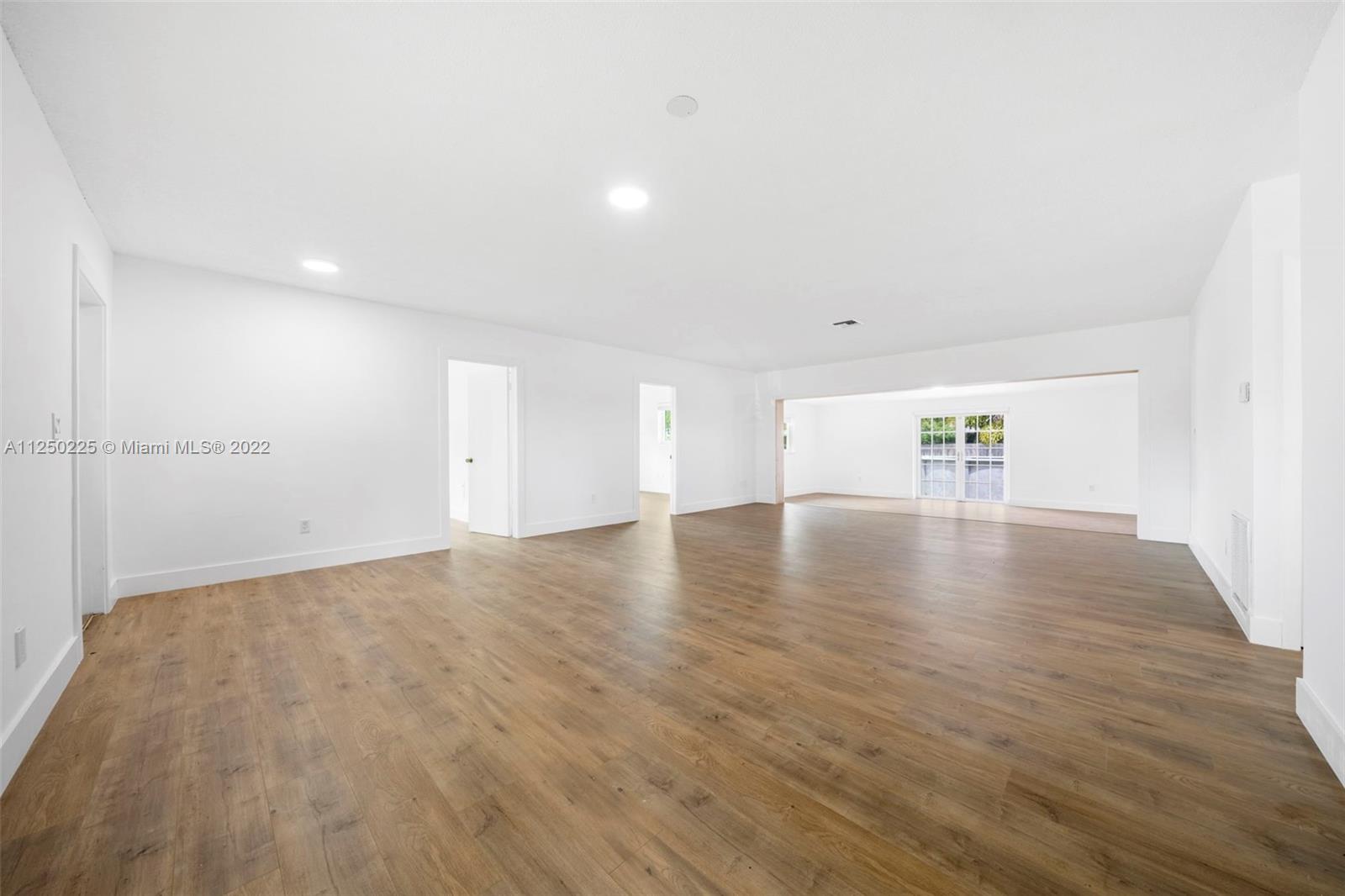 19541 Franjo Road Cutler Bay, FL 33157 - Photo 11 of 28 a view of empty room with wooden floor
