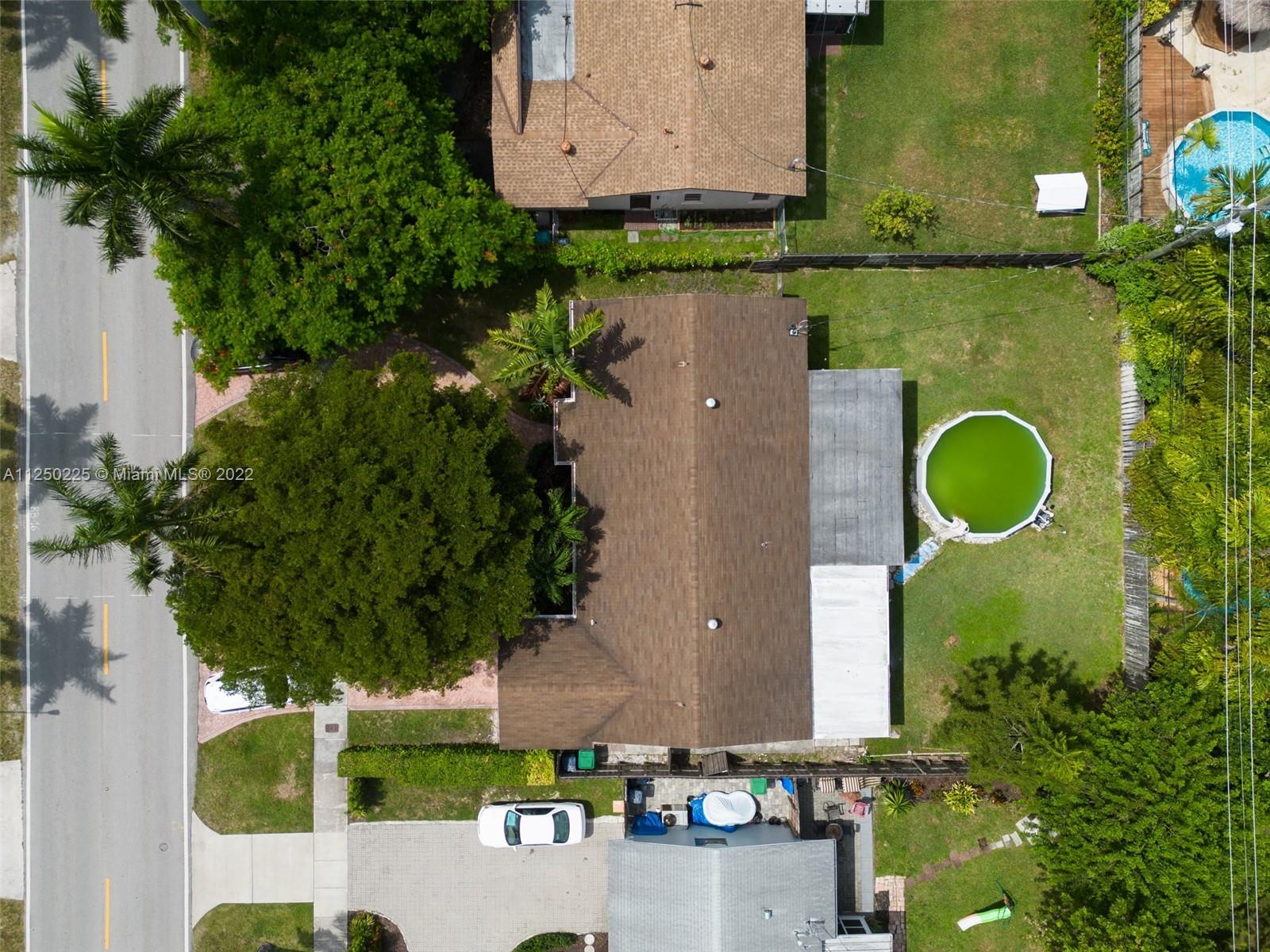 19541 Franjo Road Cutler Bay, FL 33157 - Photo 27 of 28 an aerial view of a house with a yard and a tub