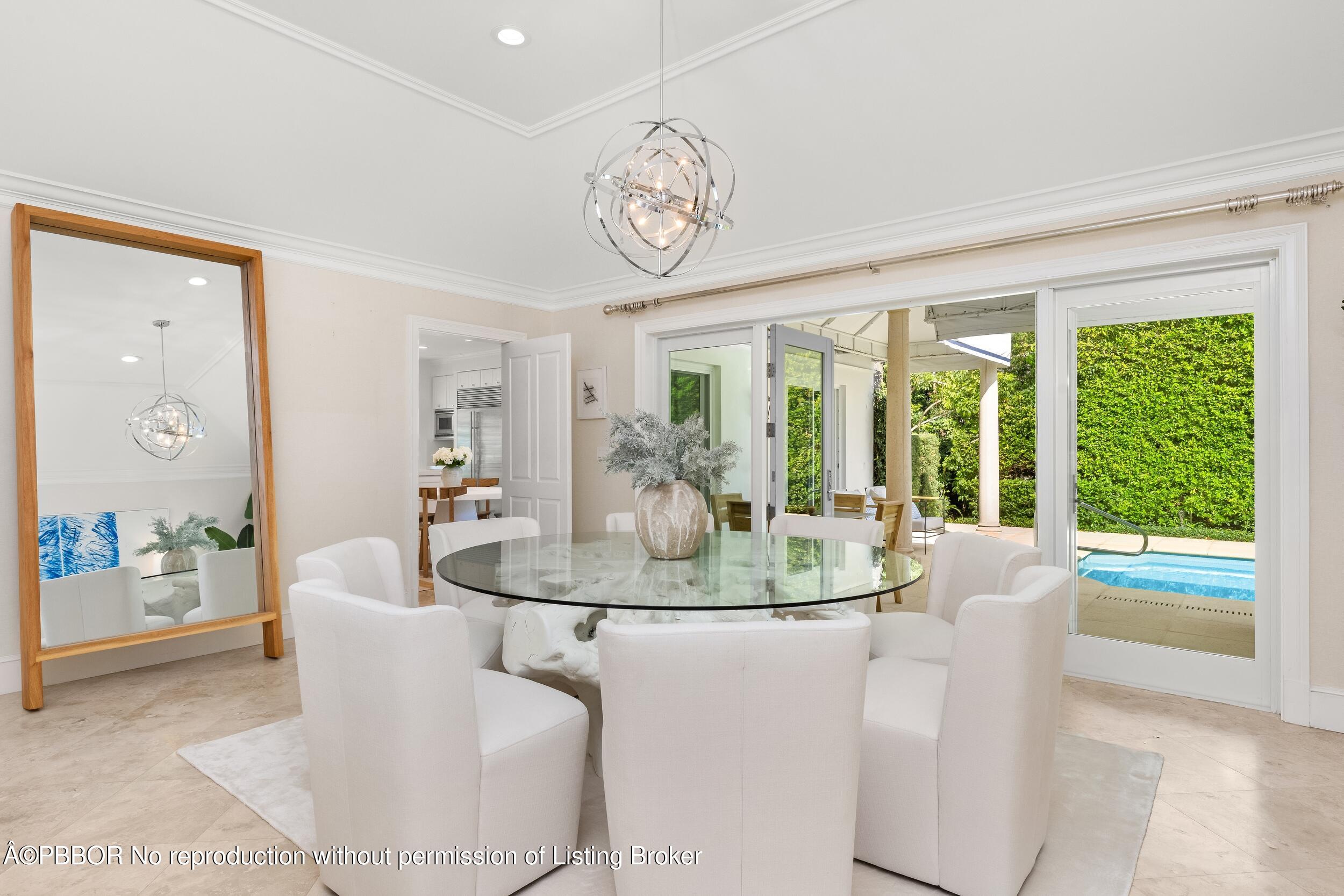 273 List Road Palm Beach, FL 33480 - Photo 22 of 54 a dining room with furniture a livingroom view and wooden floor