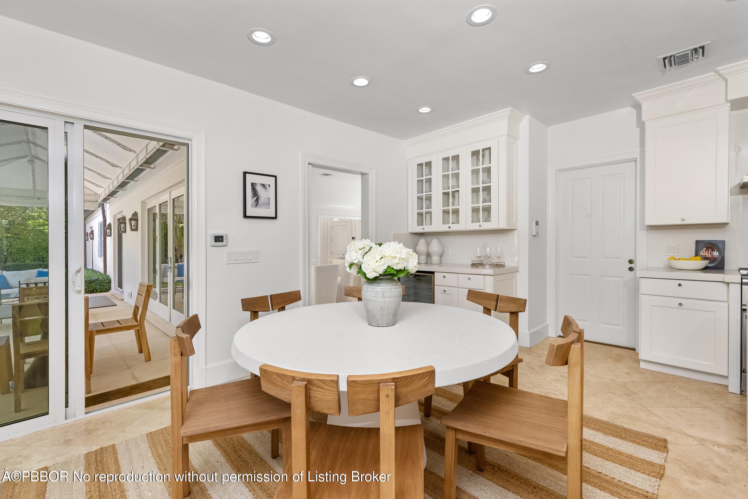 273 List Road Palm Beach, FL 33480 - Photo 28 of 54 a view of a dining room with furniture
