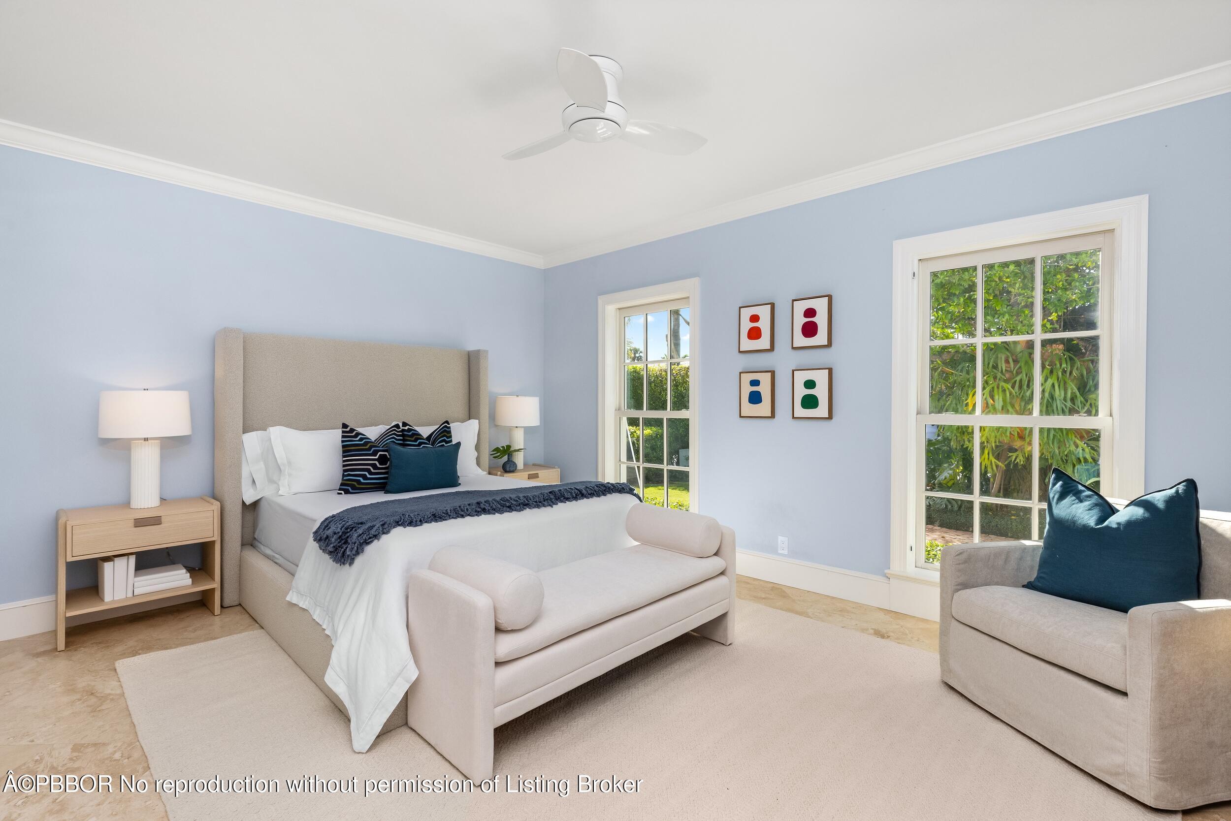 273 List Road Palm Beach, FL 33480 - Photo 35 of 54 a bedroom with a large bed couch and a window