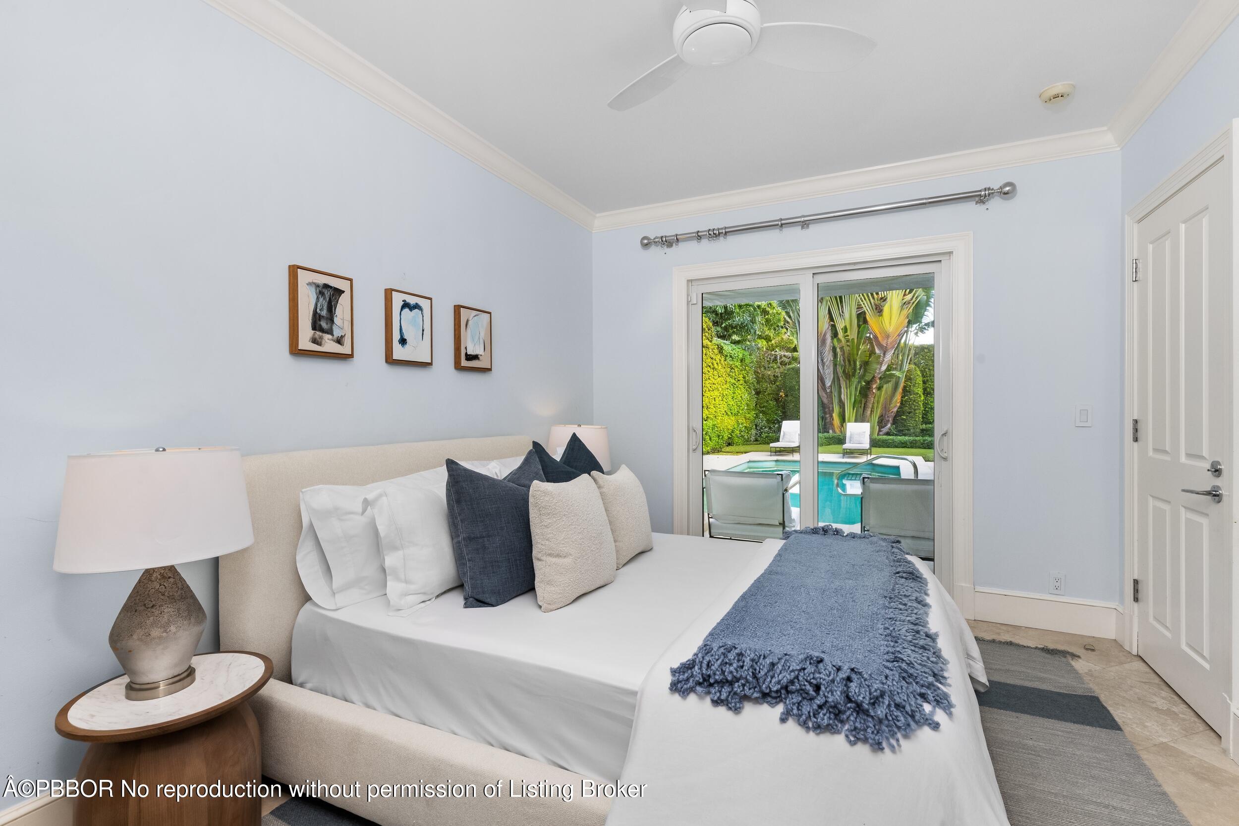 273 List Road Palm Beach, FL 33480 - Photo 39 of 54 a bed room with a bed and a window