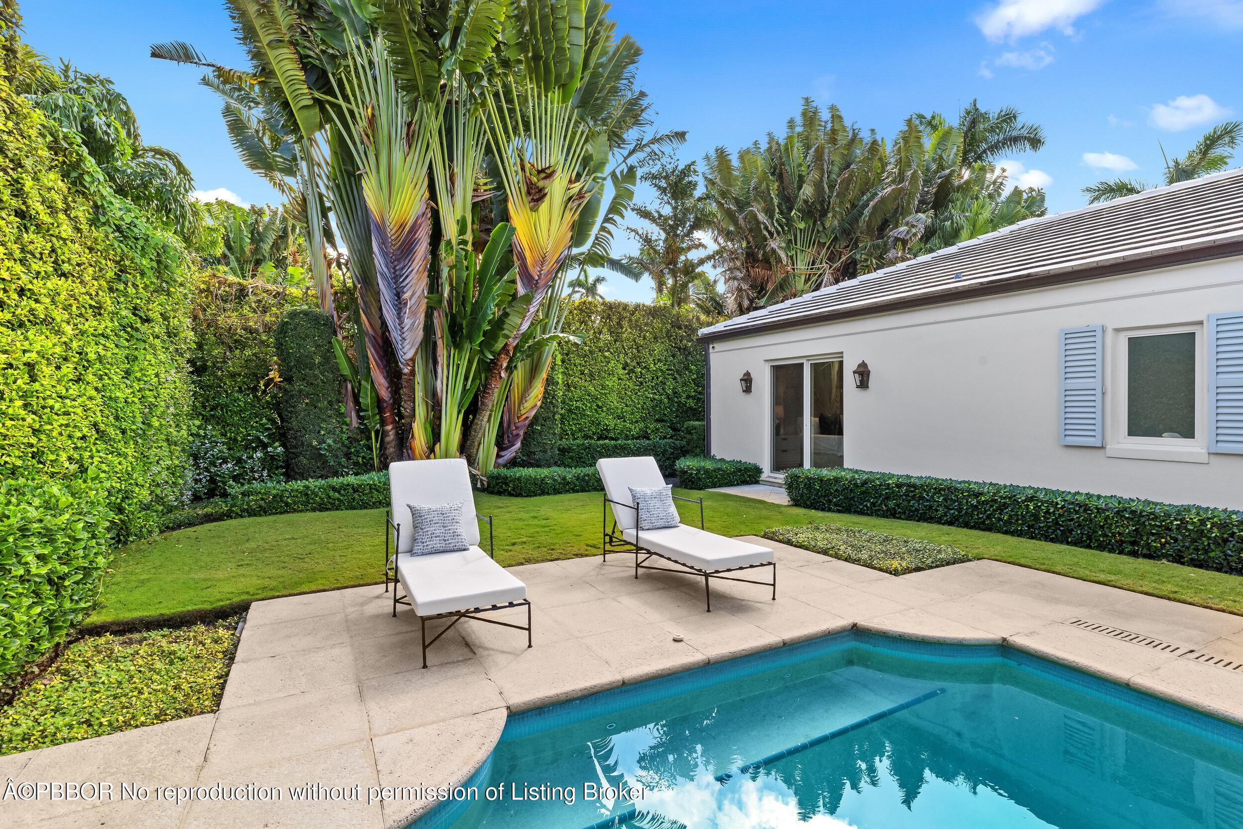 273 List Road Palm Beach, FL 33480 - Photo 43 of 54 a view of backyard with outdoor seating and green space