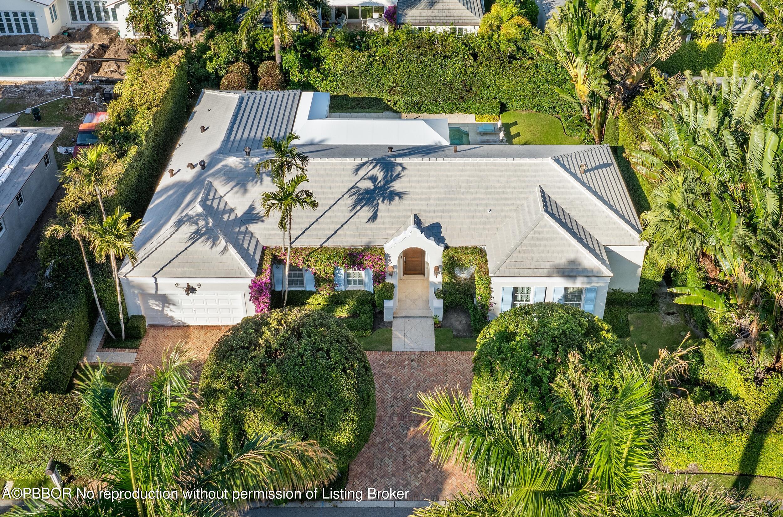 273 List Road Palm Beach, FL 33480 - Photo 48 of 54 an aerial view of multiple houses with a yard