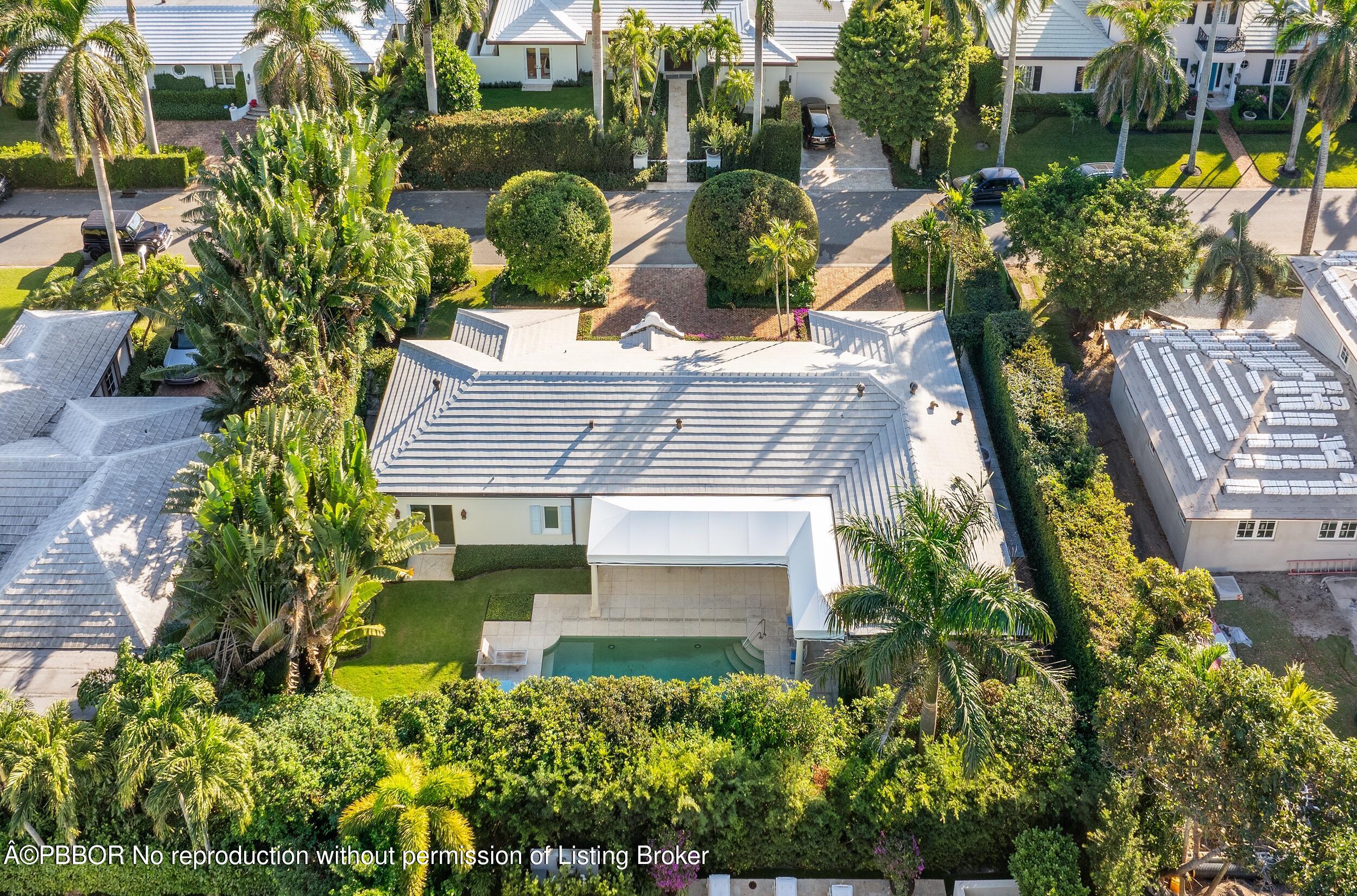 273 List Road Palm Beach, FL 33480 - Photo 49 of 54 front view of a house with a tree