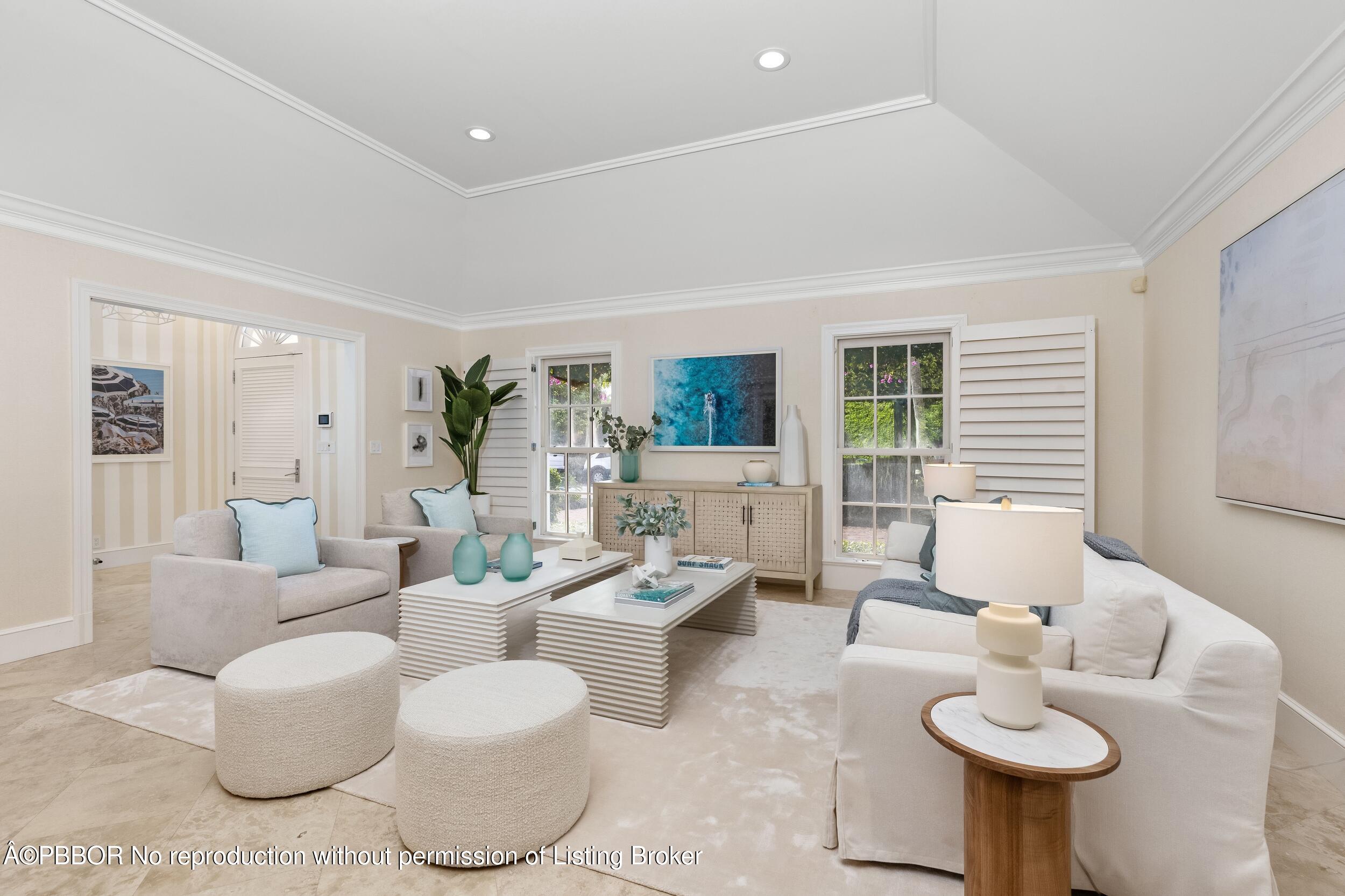 273 List Road Palm Beach, FL 33480 - Photo 9 of 54 a living room with furniture and a potted plant