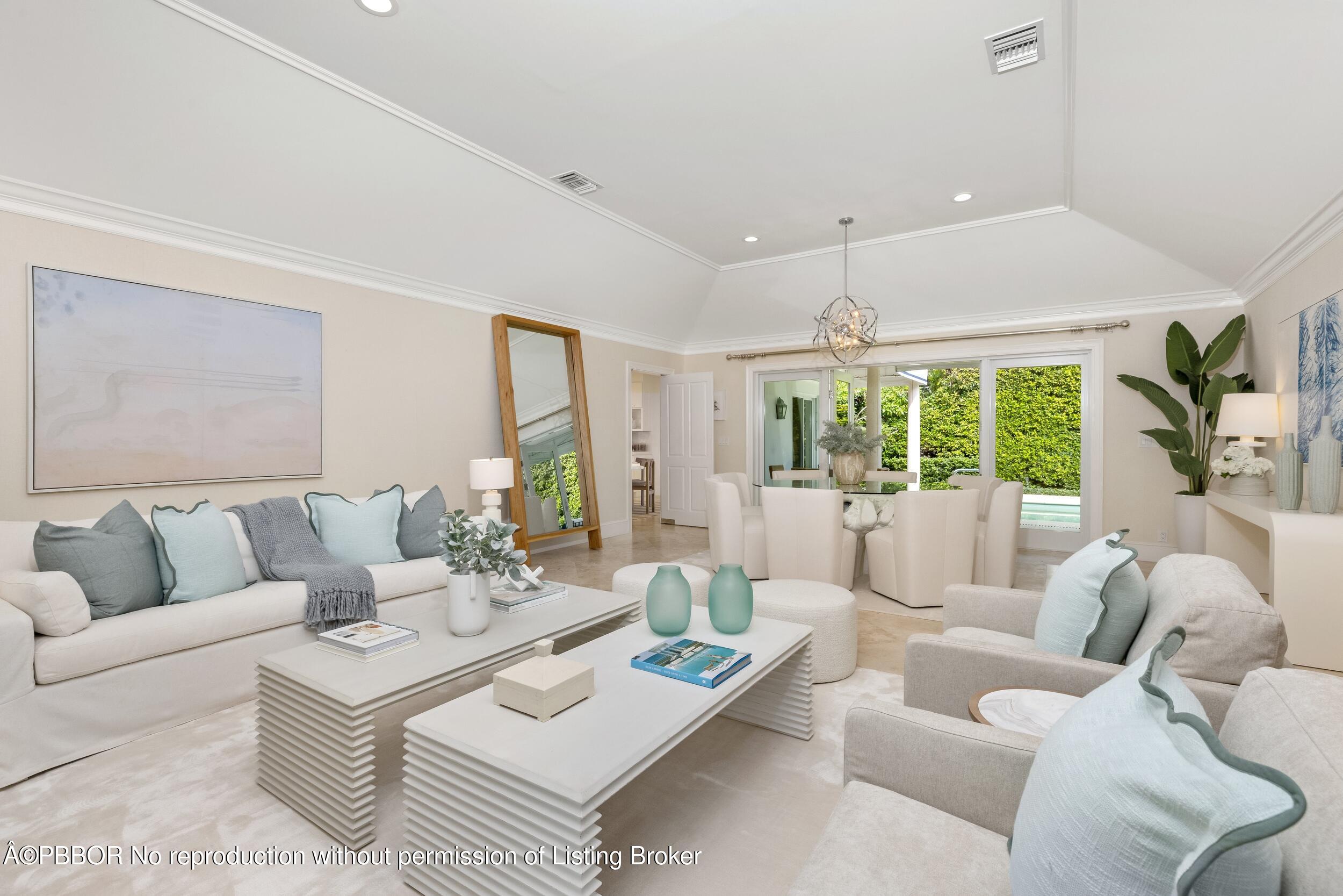 273 List Road Palm Beach, FL 33480 - Photo 10 of 54 a living room with furniture and a large window