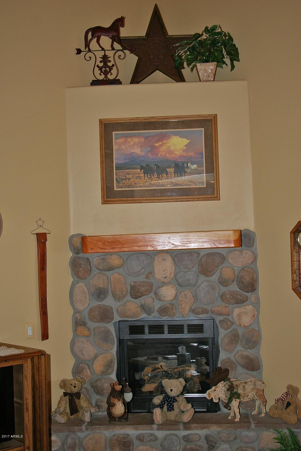 6238 Starlight Ridge Road Lakeside, AZ 85929 - Photo 6 of 27 River Rock Faced Fireplace