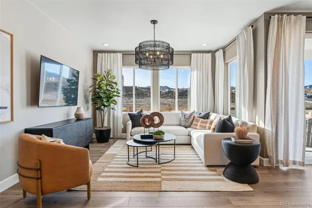 a bathroom with a sink mirror and toilet