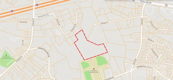 a bathroom with white walls and white shower