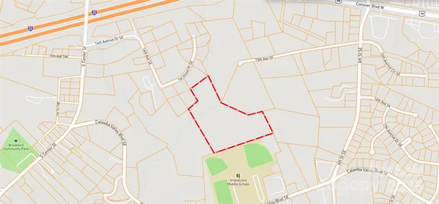 a bathroom with white walls and white shower