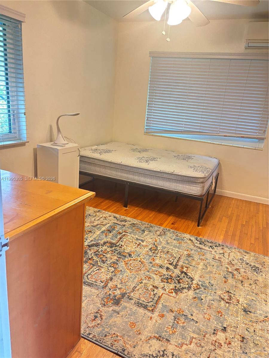 2951 Southwest 23rd Street, Unit 2 Miami, FL 33145 - Photo 6 of 7 a view of kitchen and with refrigerator