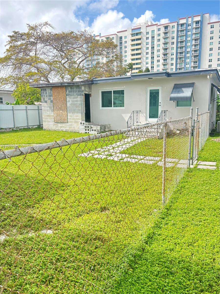 2951 Southwest 23rd Street, Unit 2 Miami, FL 33145 - Photo 7 of 7 a house view with a outdoor space
