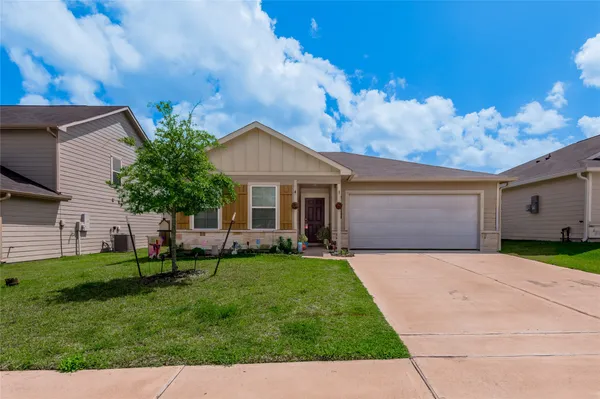 a view of a livingroom with wooden floor