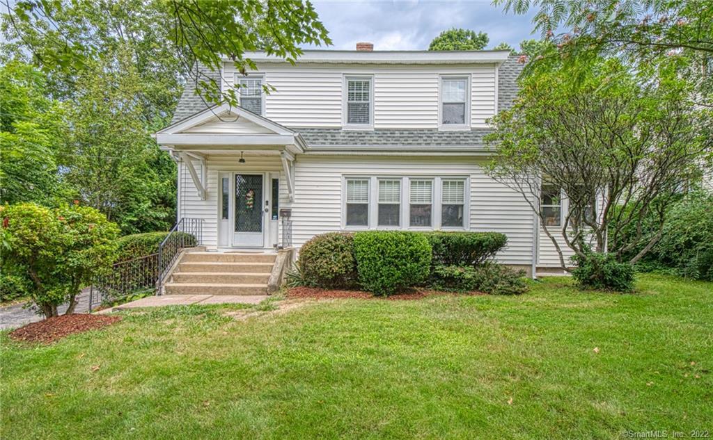 211 Wells Road Wethersfield, CT 06109 - Photo 1 of 1 a view of a house with a yard