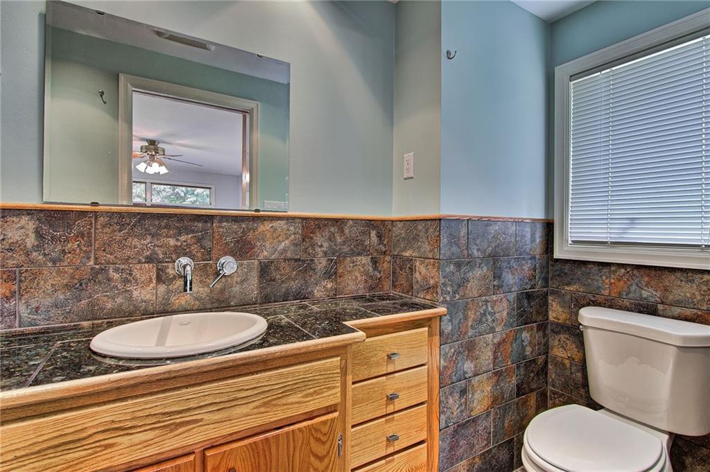 9376 Woodcrest Road Pittsburgh, PA 15237 - Photo 13 of 24 Master bath benefits from a very cool remodel. A granite top complements the handmade vanity.