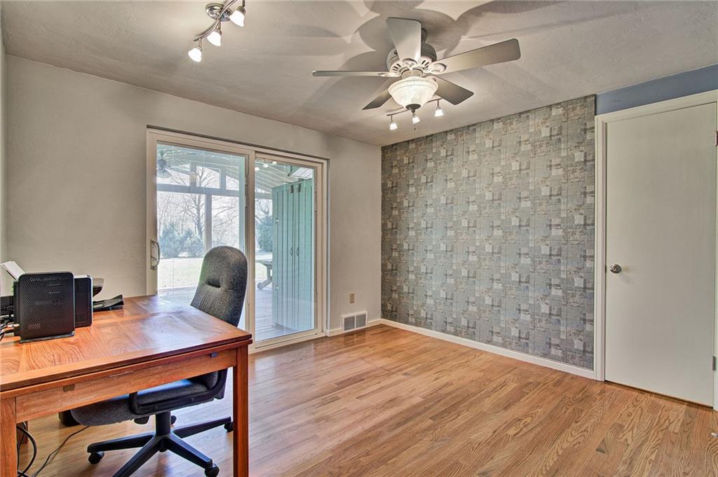 9376 Woodcrest Road Pittsburgh, PA 15237 - Photo 17 of 24 Bedroom #3 currently used as an office has amazing, contemporary light fixtures & easy access to the deck with a Jeld-Wen door with between glass blinds! Extra deep closet too!