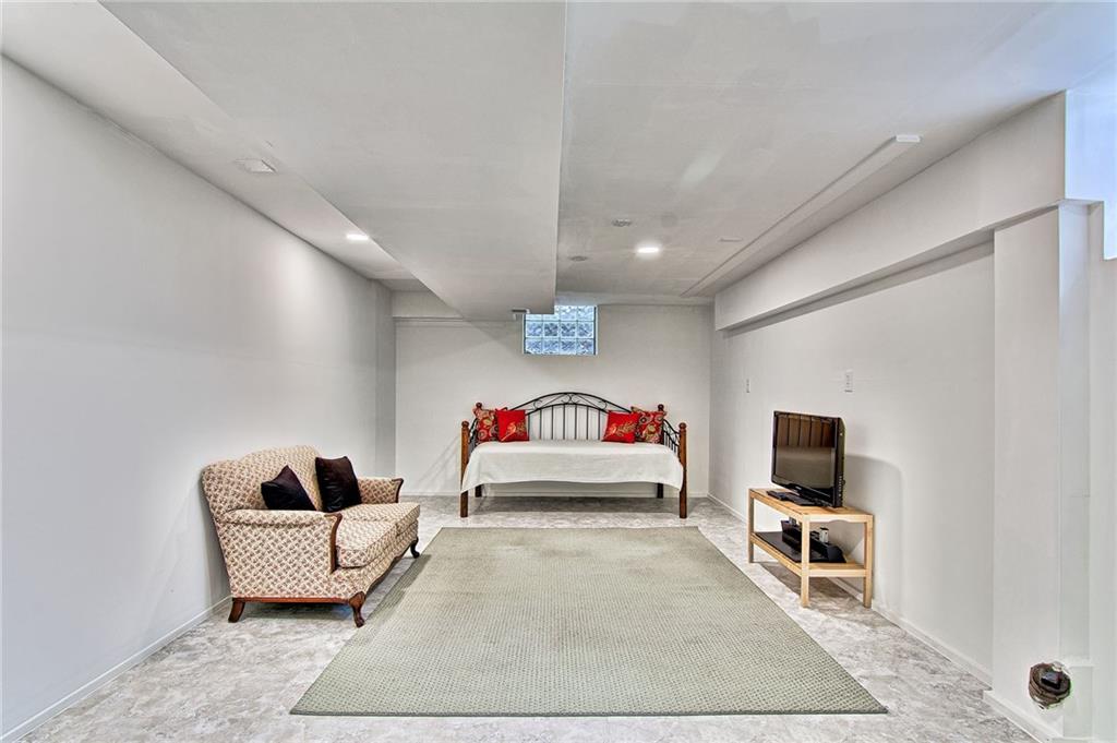 9376 Woodcrest Road Pittsburgh, PA 15237 - Photo 19 of 24 Finished lower level currently used as a TV room, can easily become your man cave or playroom.