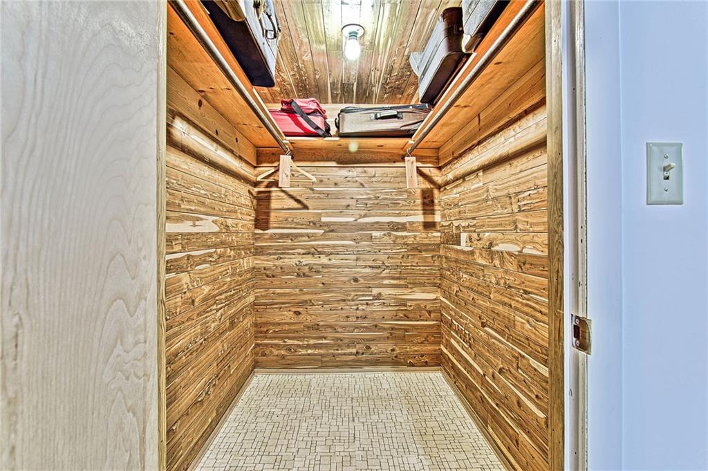 9376 Woodcrest Road Pittsburgh, PA 15237 - Photo 20 of 24 Lower level is equipped with an incredible walk-in cedar closet ~ a hallmark of a custom-built home.