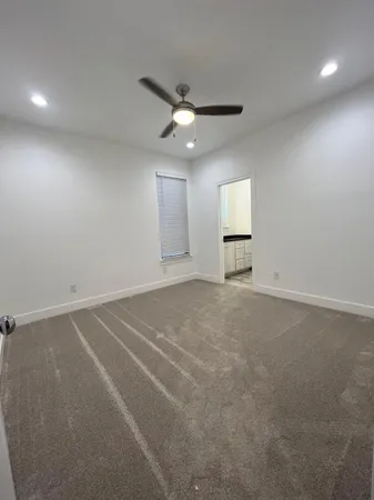 a bathroom with a double vanity sink and mirror