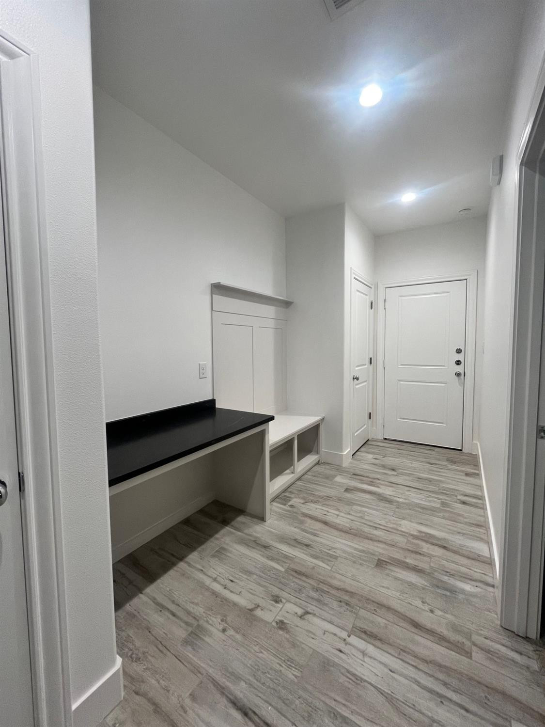 5102 58th Street, Unit 2 Lubbock, TX 79414 - Photo 15 of 18 a view of room with wooden floor