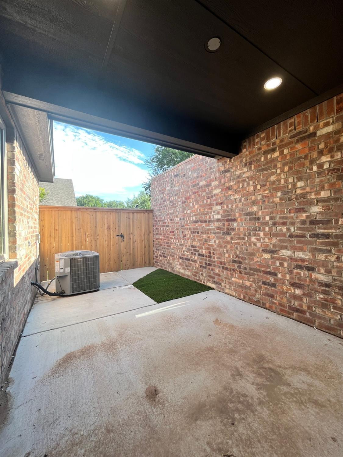 5102 58th Street, Unit 2 Lubbock, TX 79414 - Photo 17 of 18 a view of a backyard of the house