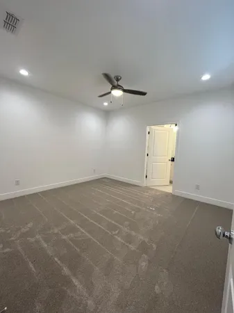 a view of an empty walk in closet