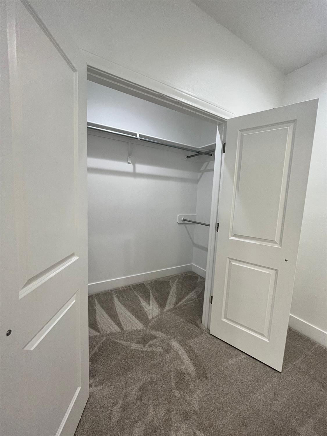 5102 58th Street, Unit 2 Lubbock, TX 79414 - Photo 8 of 18 a view of an empty walk in closet