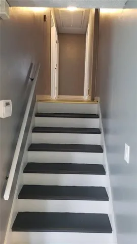 a view of entryway with a front door