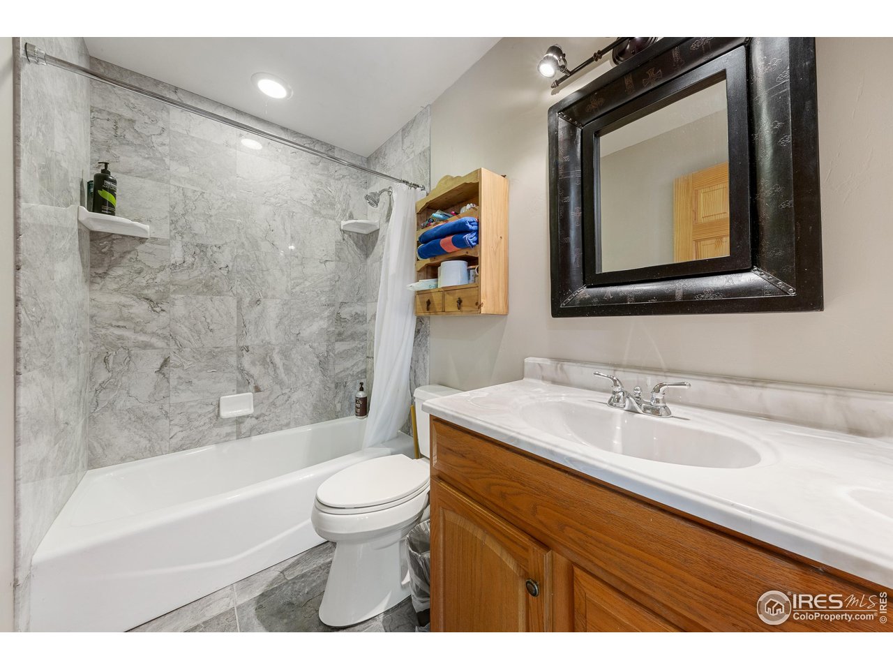 320 Mill Road Eagle, CO 81631 - Photo 12 of 32 a bathroom with a sink a toilet and a bathtub