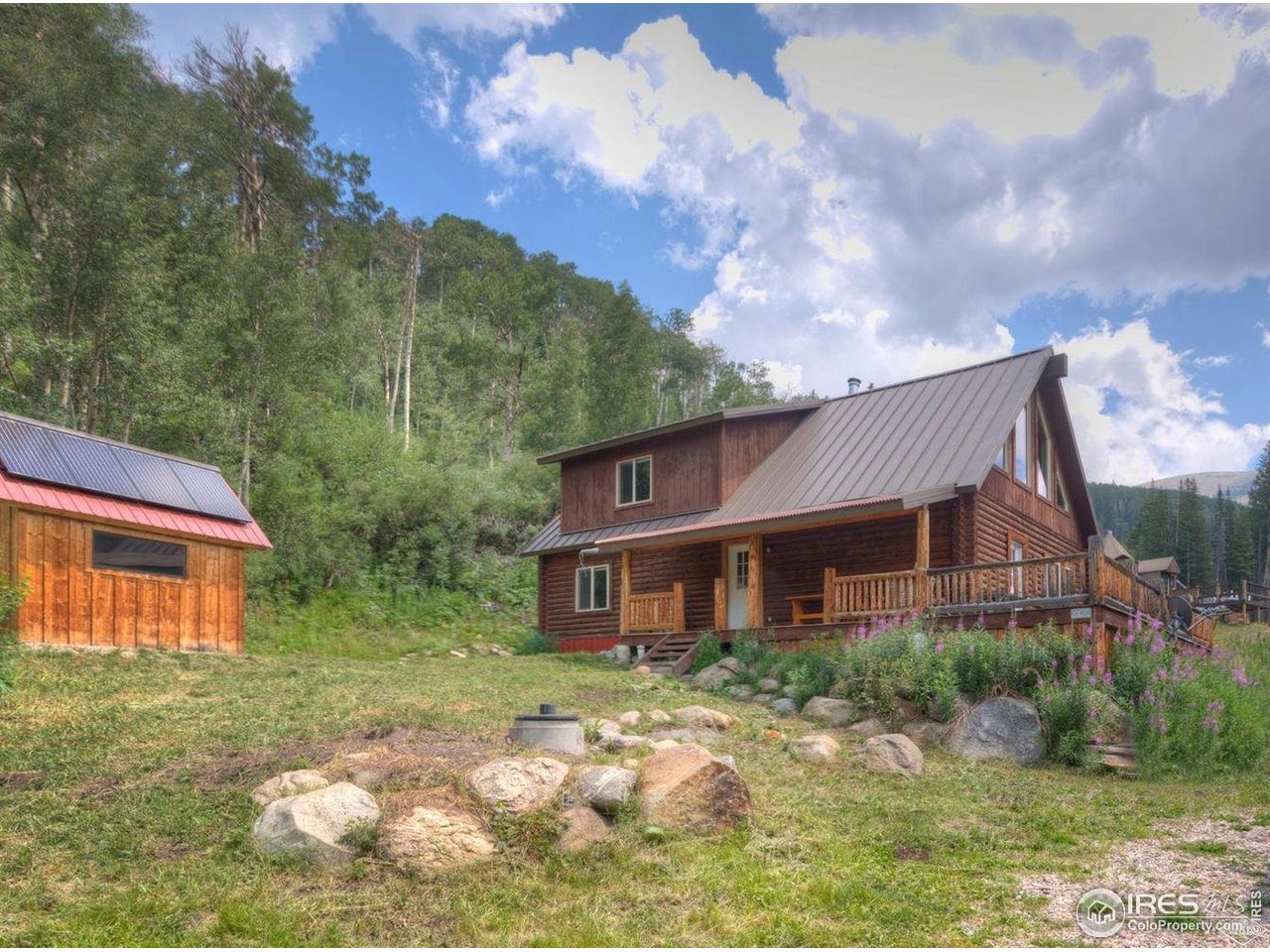 320 Mill Road Eagle, CO 81631 - Photo 2 of 32 a front view of a house with garden